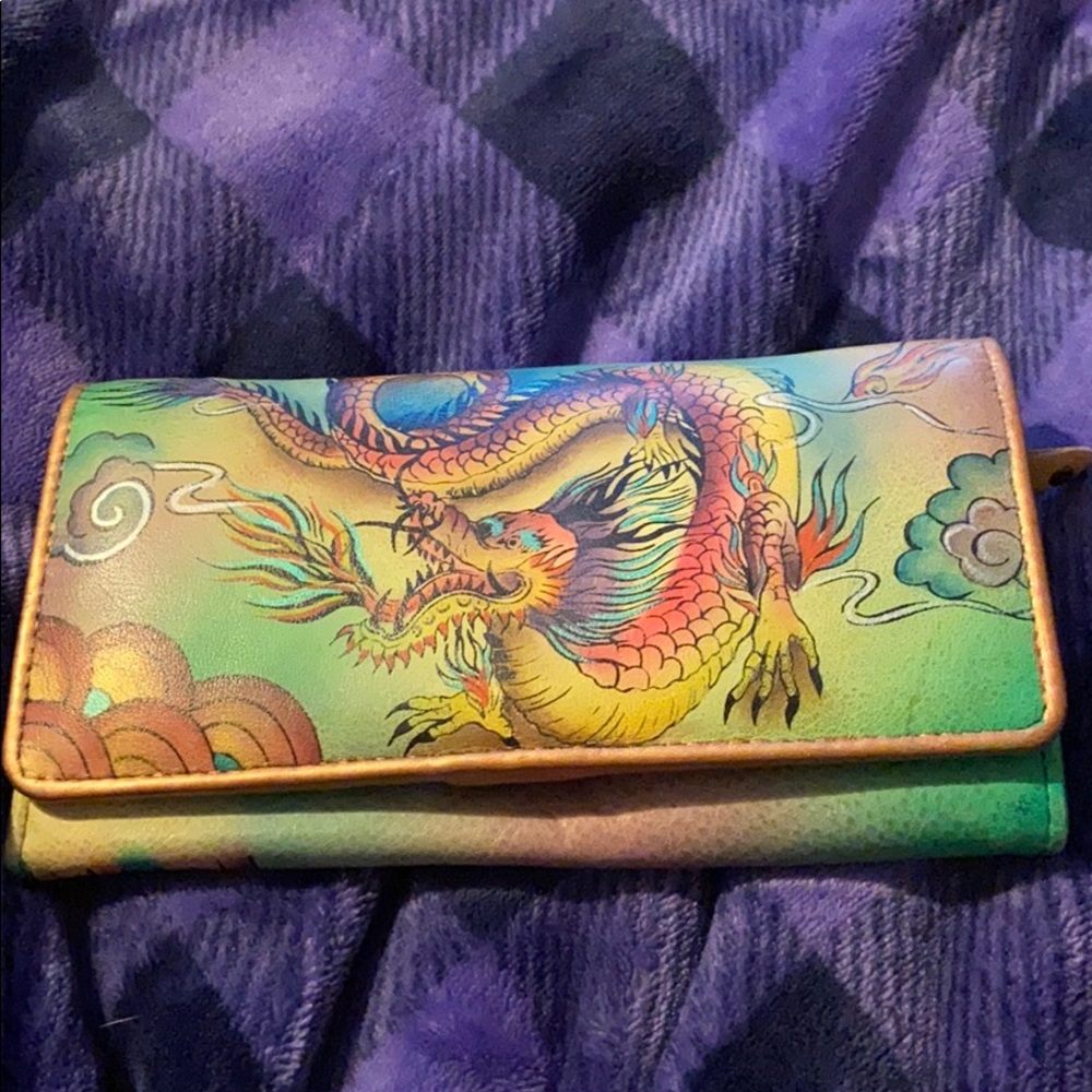 Anushka wallet. Multiple card slots and zippers.